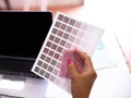 Hand Near Laptop Holding Color Palette And Fabric Indoor, Closeup Royalty Free Stock Photo