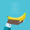 Hand of negroid businessman holds banana icon Royalty Free Stock Photo