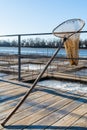 A hand net for scooping fish in fish farm Royalty Free Stock Photo