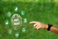 hand with net zero environmental icons CO2 emission reduction icons global warming sustainable development and green business Royalty Free Stock Photo