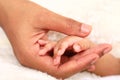 Hand of newborn baby boy in mother`s hand Royalty Free Stock Photo