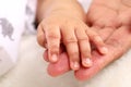 Hand of newborn baby boy on mother`s hand Royalty Free Stock Photo