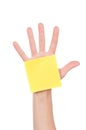 Hand and note paper Royalty Free Stock Photo
