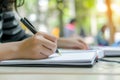 Hand with notebook for studying, learning and creative notes for academic class. Student writes information. Generative Royalty Free Stock Photo