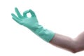 Hand ok sign. Man& x27;s hand in green rubber glove shows symbol of fine Royalty Free Stock Photo