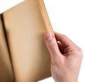 Hand with old book isolated on white background Royalty Free Stock Photo
