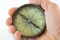 Hand with old compass Royalty Free Stock Photo