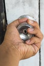 Hand on old door knobs Royalty Free Stock Photo