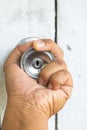 Hand on old door knobs Royalty Free Stock Photo