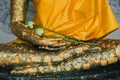 Hand of old golden Buddha with lotus in Thai temple. Royalty Free Stock Photo