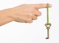 Hand with old key Royalty Free Stock Photo