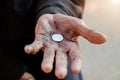 Hand old man begging for money because of the hunger vintage tone Royalty Free Stock Photo