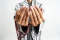 Hand open arm while pray in islamic culture Royalty Free Stock Photo