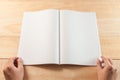 Hand open blank book or magazines Royalty Free Stock Photo