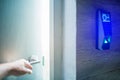 Hand open the door with finger scan access control system to unlock at safe room. blurry image Royalty Free Stock Photo