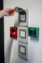 Hand open electric box switch near the push in pull down switch Royalty Free Stock Photo