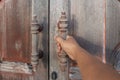 Hand open old vintage wood Door Royalty Free Stock Photo