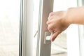 Hand open window at home Royalty Free Stock Photo