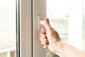 Hand open window at home Royalty Free Stock Photo