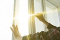 a hand open window to get some fresh air inside the room Royalty Free Stock Photo