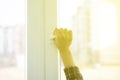 a hand open window to get some fresh air inside the room Royalty Free Stock Photo