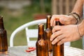 Hand opening a beer bottle Royalty Free Stock Photo