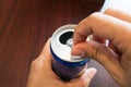 Hand opening a beverage Royalty Free Stock Photo