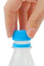 Hand opening bottle of water Royalty Free Stock Photo