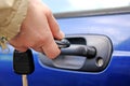 Hand opening the car door Royalty Free Stock Photo