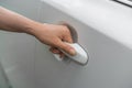 Hand opening car door handle Royalty Free Stock Photo