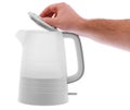 The hand opens the lid of an electric kettle on a white isolated background Royalty Free Stock Photo