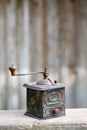 Hand-operated old metallic coffee or spices grinder Royalty Free Stock Photo