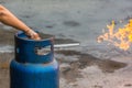 Hand operating valve of LPG cylinder for cooking with fire, Close up valve LPG Royalty Free Stock Photo