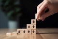 Hand organizing achievement progress cubes. Generate ai Royalty Free Stock Photo