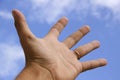 Hand Outstretched and Sky Royalty Free Stock Photo