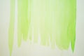 Hand painted aquarelle. Yellow-green brush strokes on a white background. Spring freshness watercolor background Royalty Free Stock Photo