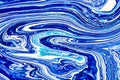 Hand painted background with mixed liquid blue, white, yellow paints. Abstract fluid acrylic painting. Applicable for Royalty Free Stock Photo