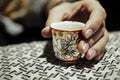 Ceramic cup in a hand