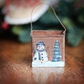 A Hand Painted Christmas Ornament with Blurred Space for Copy.