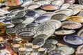 hand-painted dishes of a multitude of colors in a traditional ar