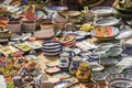 hand-painted dishes of a multitude of colors in a traditional ar