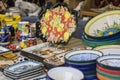 hand-painted dishes of a multitude of colors in a traditional ar