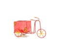 A hand-painted distressed-looking rustic tricycle