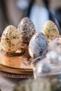 Hand painted easter eggs among other objects out of focus Royalty Free Stock Photo