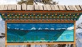 Hand painted Information board describing the most high mountains of JIGME SINGYE WANGCHUCK Himalayan Range visible on Dochula Pas