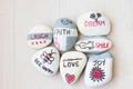 Hand painted motivational stones DIY Royalty Free Stock Photo