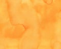 Hand painted watercolor background with artistic stains and brush strokes in bright orange color.