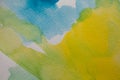 Hand painted watercolor background. Yellow and blue watercolor brush strokes on textured paper. Royalty Free Stock Photo