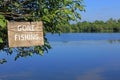 A Wooden gone fishing sign