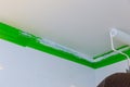 Hand painting ceiling in bathroom painting with roller Royalty Free Stock Photo